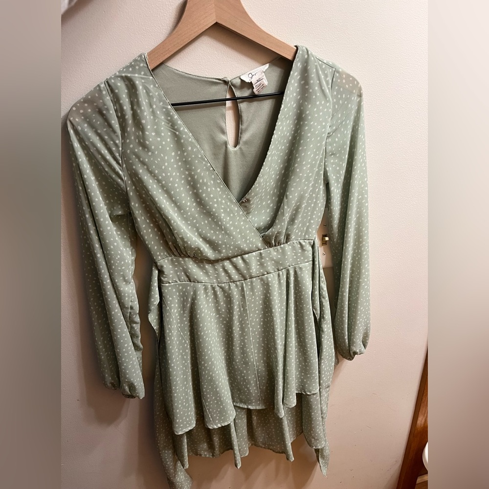 Long-sleeve sea green dress with white polka dots, ties in back